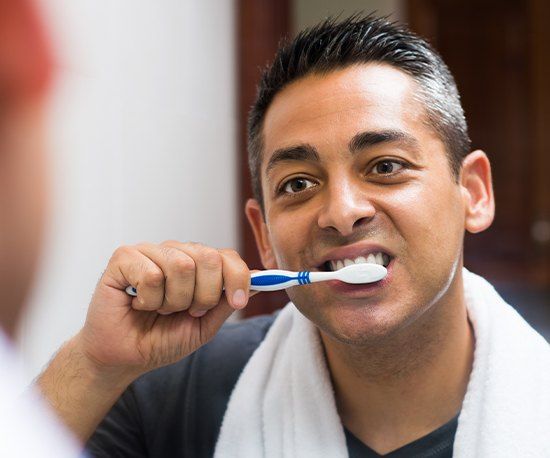 Man brushing his teeth