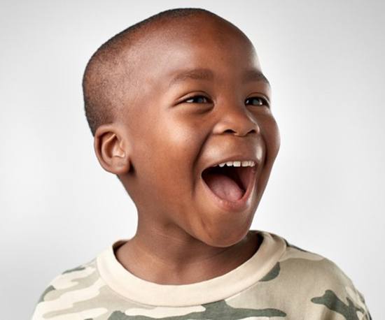 Boy smiles after visiting his Murphy children’s dentist 