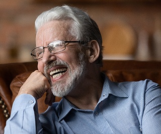 Man laughing with dentures