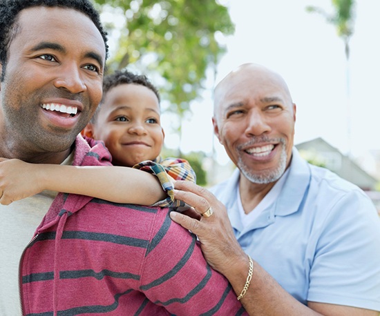 Male family members, all smiling