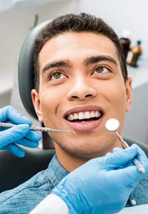 patient getting dental checkup near Sachse