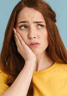 young woman with toothache