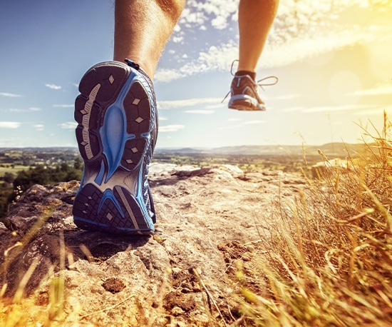 Person taking a hike outdoors