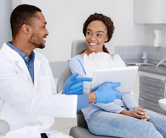 Woman talking with a dentist