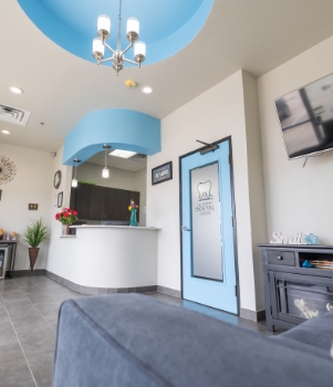 Team members in hallway to dental treatment room in Murphy