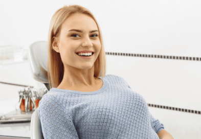 Smiling woman in dental chair