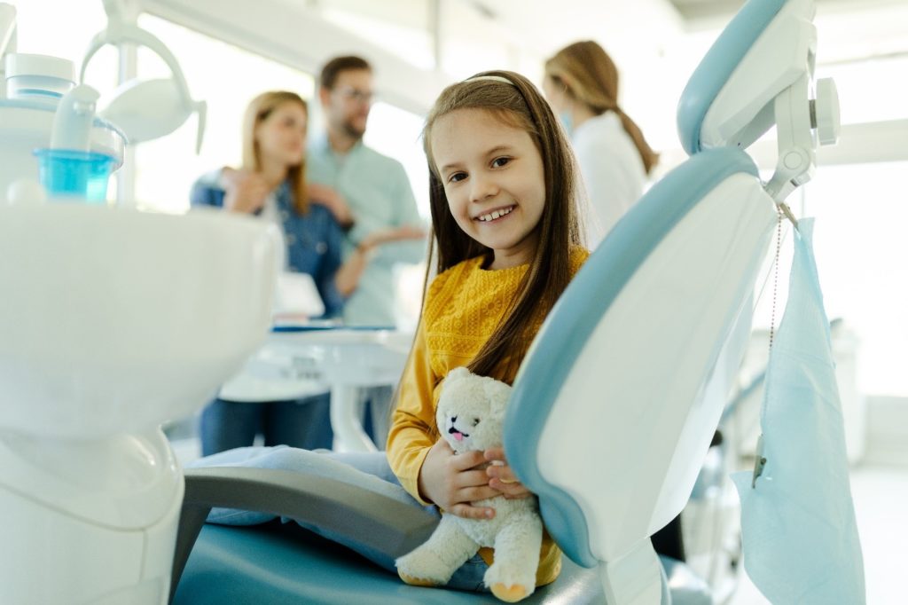 Child at the dentist to receive dental sealants. 