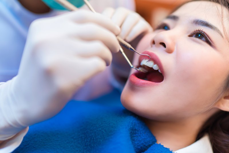a patient undergoing a dental checkup in Murphy