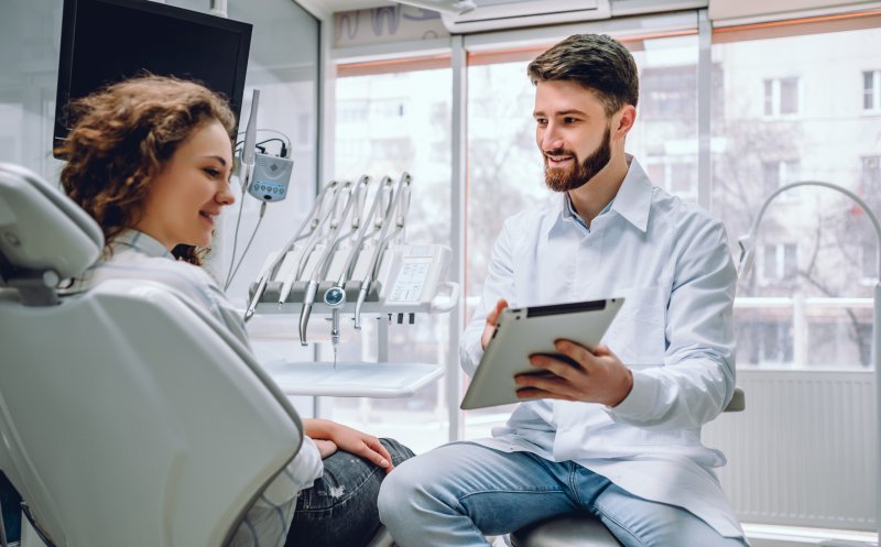 Woman smiling in the dental chair