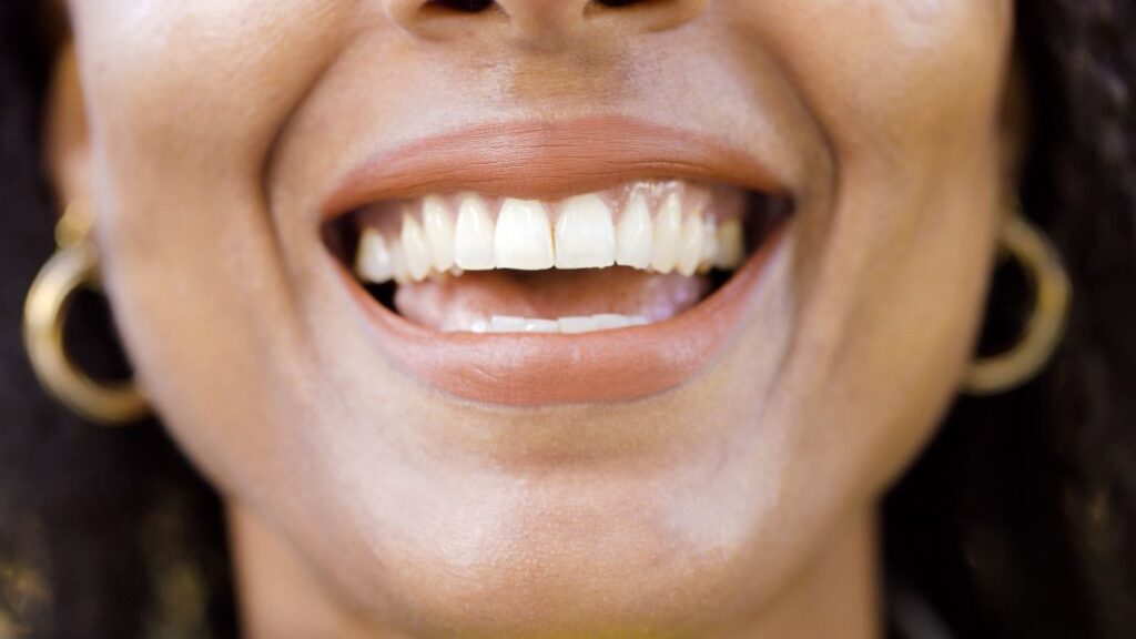A closeup of a woman’s mouth.